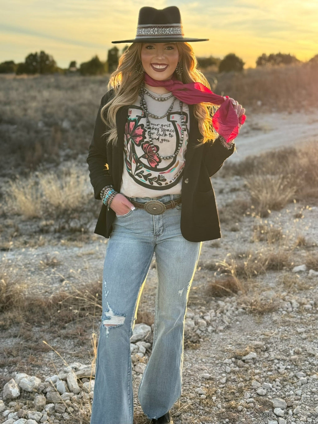 Heather tan Lauren's Horseshoe Tee by Texas True Threads, showing a casual cotton T-shirt with a horseshoe graphic.