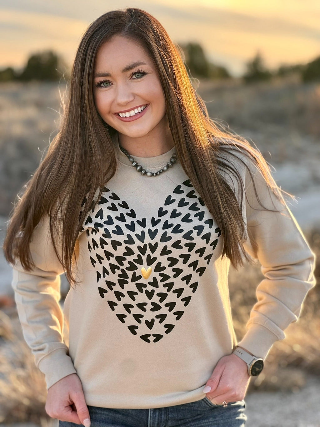 Heather tan Texas True Threads Tiny Hearts with Gold Puff Tee and sweatshirt, casual tees with playful heart design.
