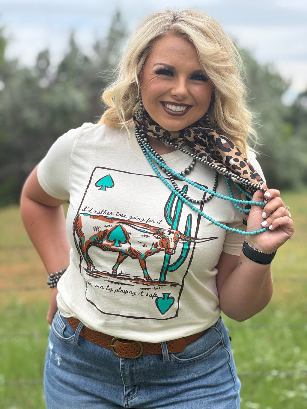 Natural fit Texas True Threads Lauren's Longhorn Tee in XS, featuring a casual natural-colored cotton tee with longhorn graphic.