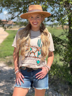 Natural Texas True Threads Lauren's Longhorn Tee in natural color, featuring a longhorn graphic, casual fit, and soft fabric.