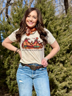 Texas True Threads Lauren's Mesa Sunset Scene Tee, natural short-sleeve cotton tee featuring a colorful sunset landscape design.
