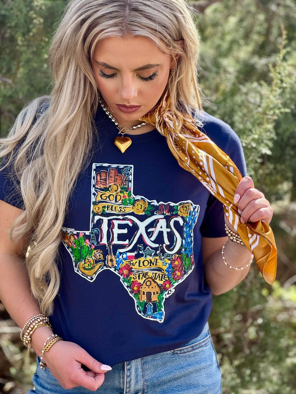 Navy Callie Ann Stelter God Bless Texas Tee from Texas True Threads, featuring a casual fit and Texas-themed design.