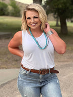 White Jules V-neck sleeveless top by Texas True Threads, casual sleeveless blouse with a V-neck design.