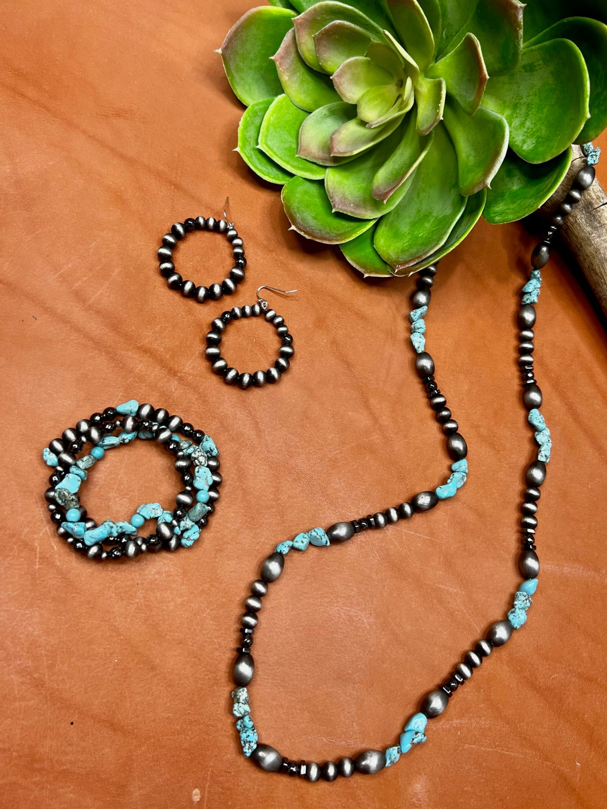 Set of Texas True Trends Dallas bracelet set featuring stylish layered bracelets with beaded and metallic accents.