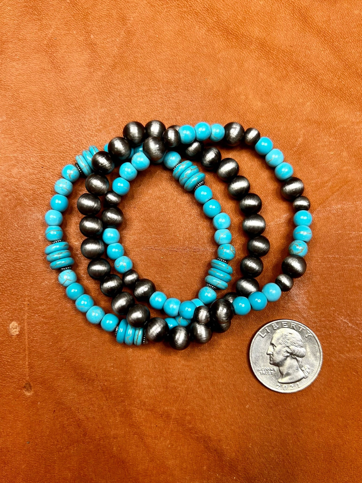 Set of Texas True Trends Fort Worth bracelets featuring mixed metals and beaded designs on a neutral background.