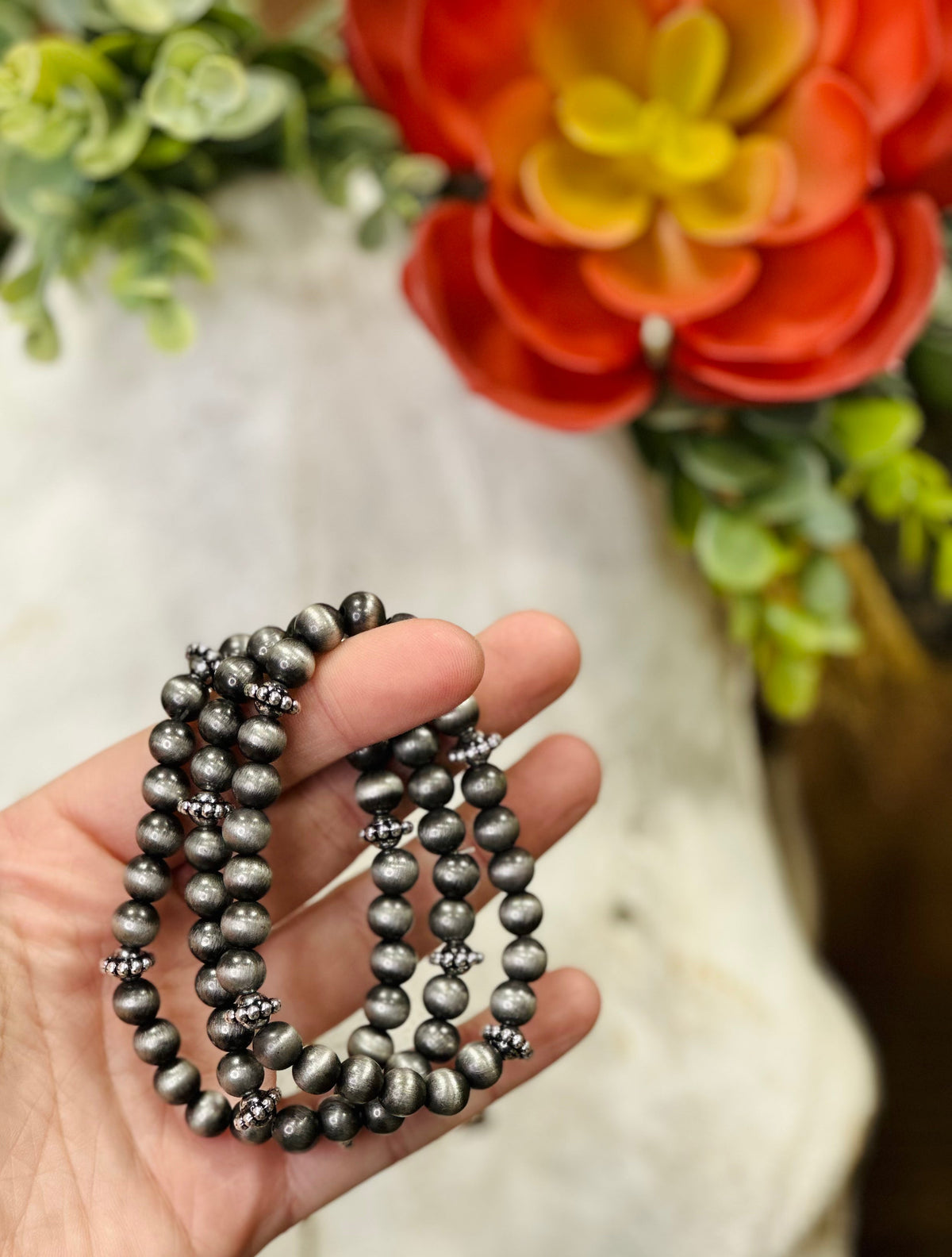 Set of Texas True Trends Pecos bracelets featuring mixed beads and charms, layered for a boho-inspired look.