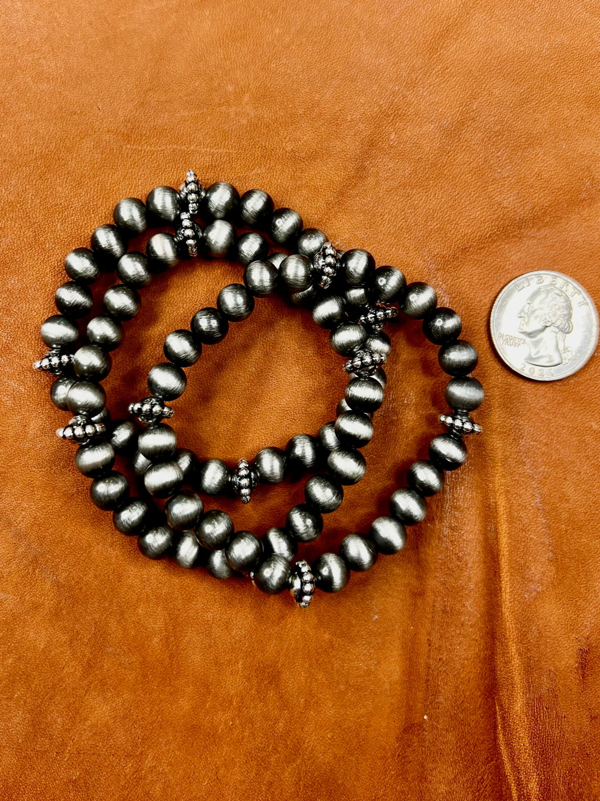 Set of Texas True Trends Pecos bracelets featuring layered beaded and leather designs, perfect for casual or boho styles.