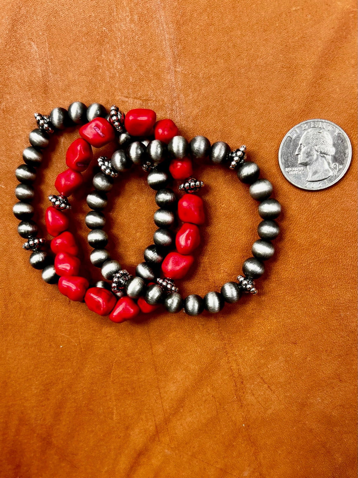 Set of Stanton bracelets by Texas True Trends featuring mixed metal designs and adjustable closures.