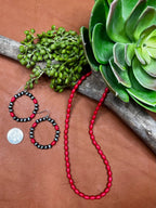 Texas True Trends Lubbock earrings featuring silver hoops with intricate southwestern-inspired designs.
