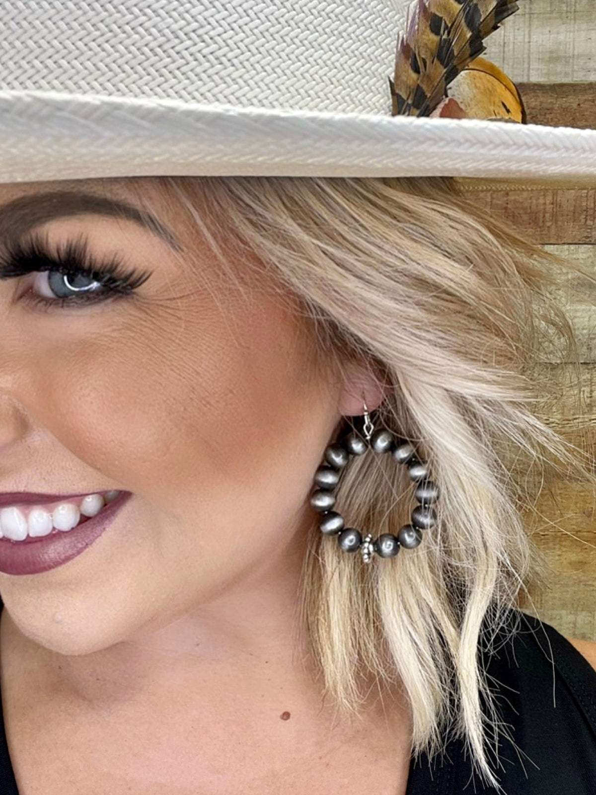 Texas True Trends Pecos Earrings featuring silver hoops with Southwestern-inspired design and turquoise accents.