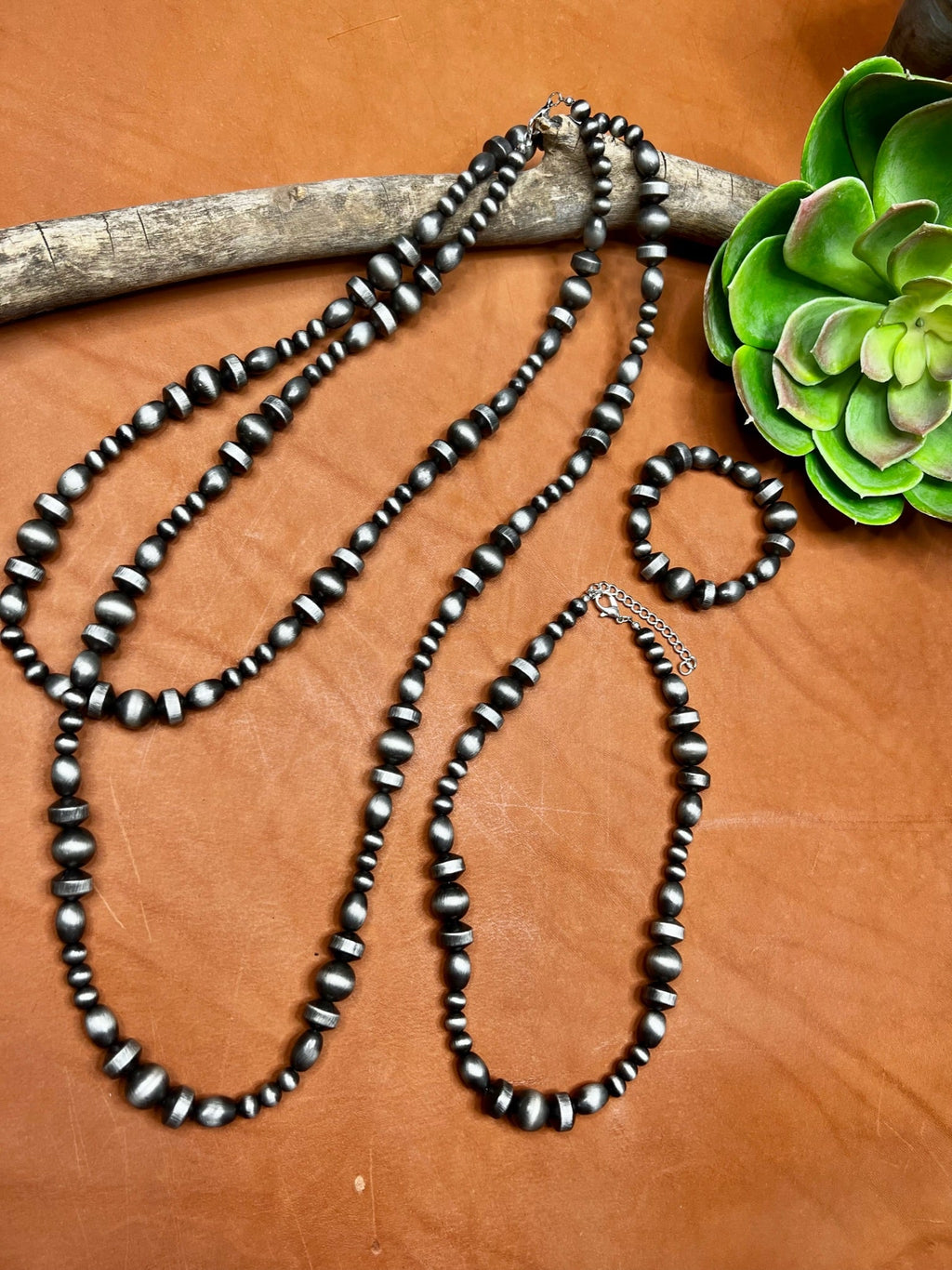 Long Amarillo necklace by Texas True Trends featuring yellow beads and intricate design, displayed on a neutral background.