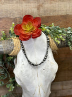 Texas True Trends Amarillo Short Necklace featuring layered gold-toned chains and delicate pendant details.