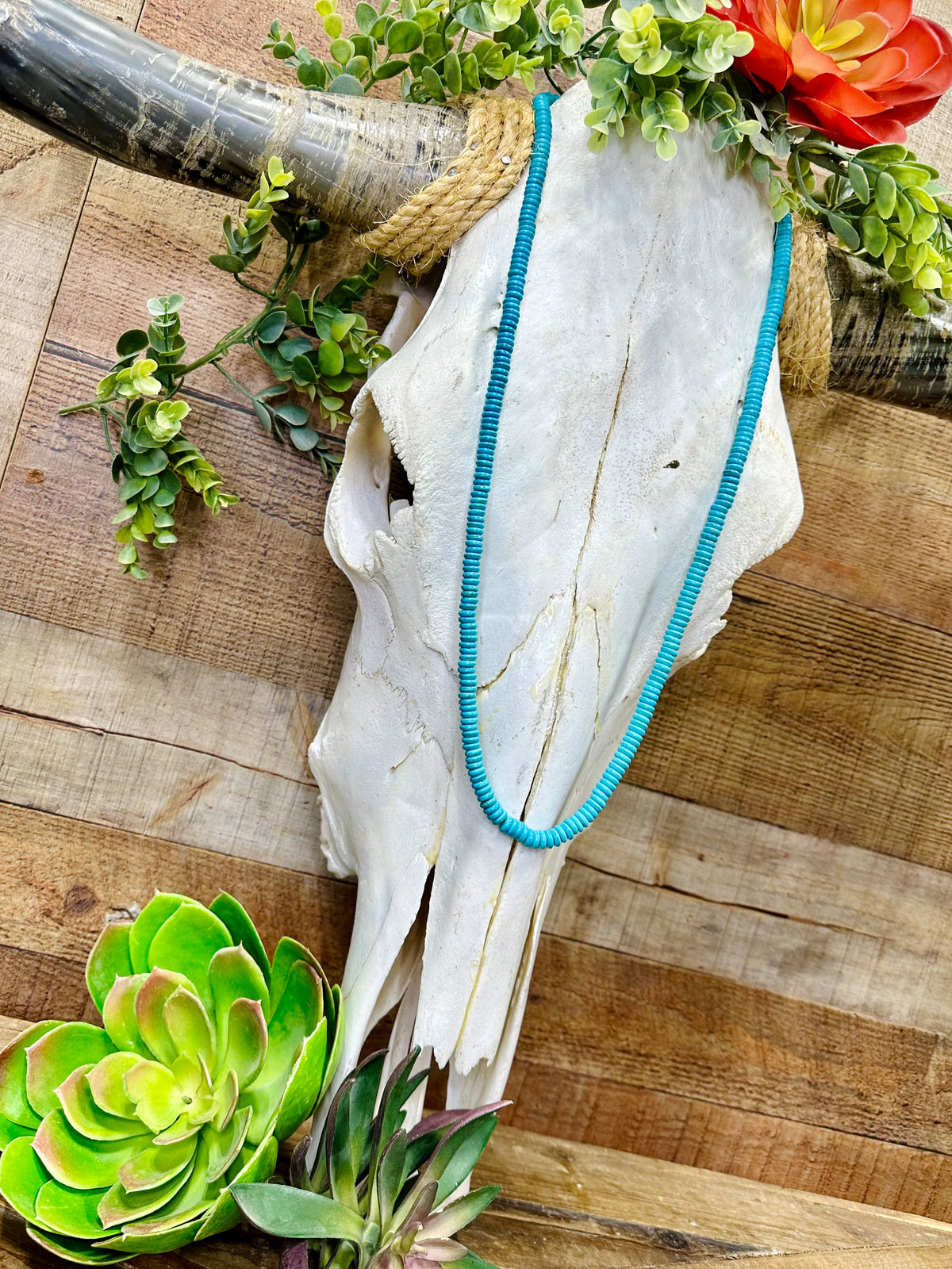 Texas True Trends Fort Worth Long Necklace featuring layered gold chains and intricate pendant design.