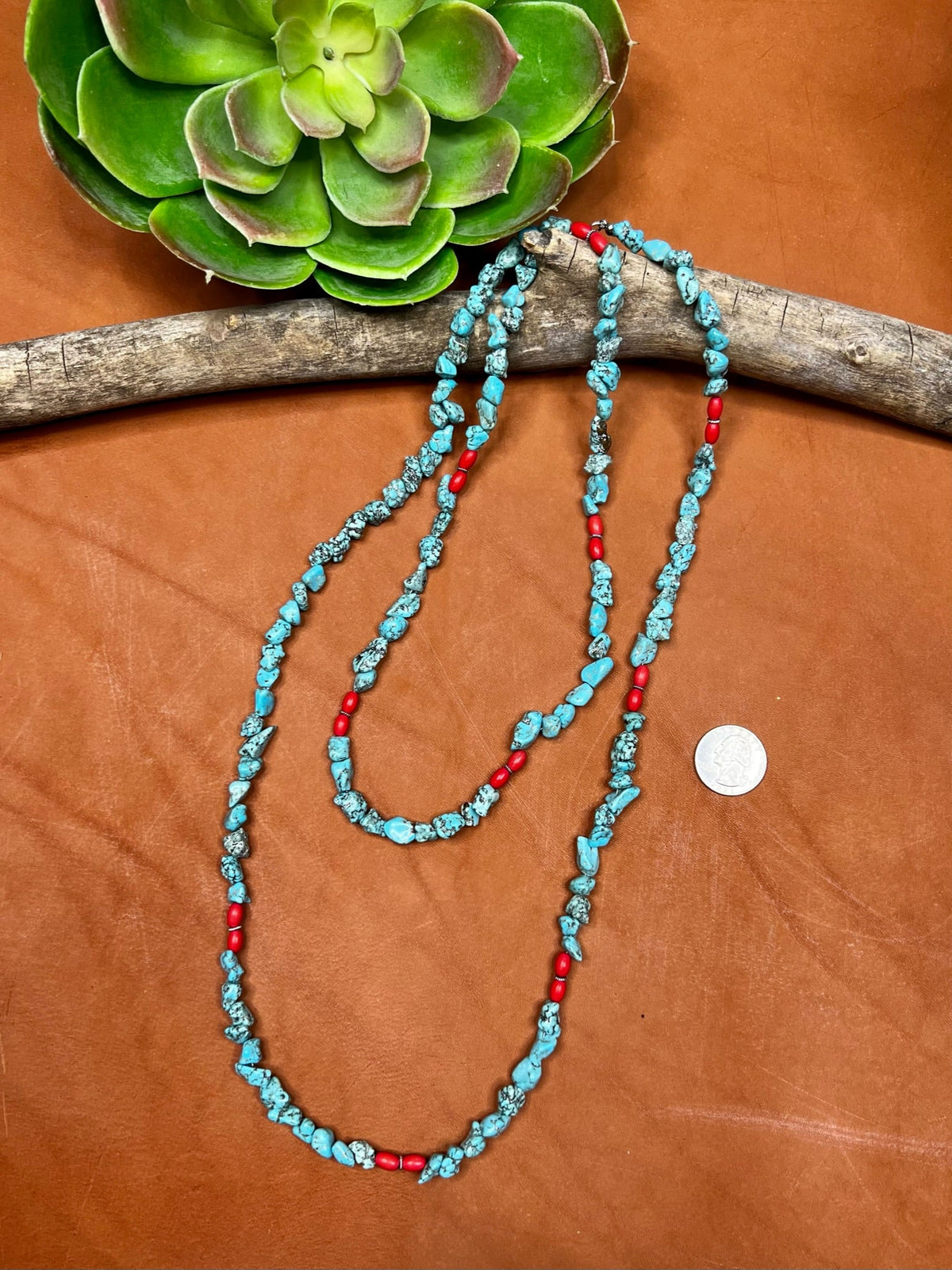 Nocona Necklace from Texas True Trends featuring silver-tone chain with southwestern-inspired pendant.