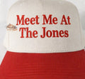 Vintage embroidered hat by The Babe Co. with "Meet Me At The Jones" design, casual accessory with detailed embroidery.