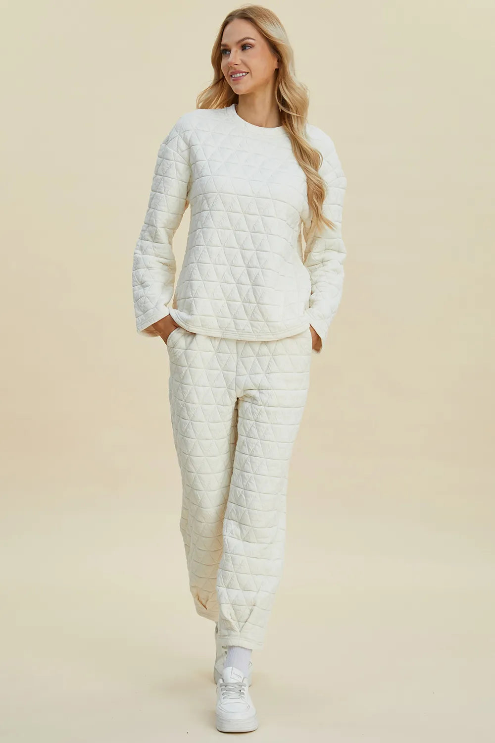 Beige Trendsi Double Take textured full-size long sleeve top and matching pants set, focused on the pants detail.