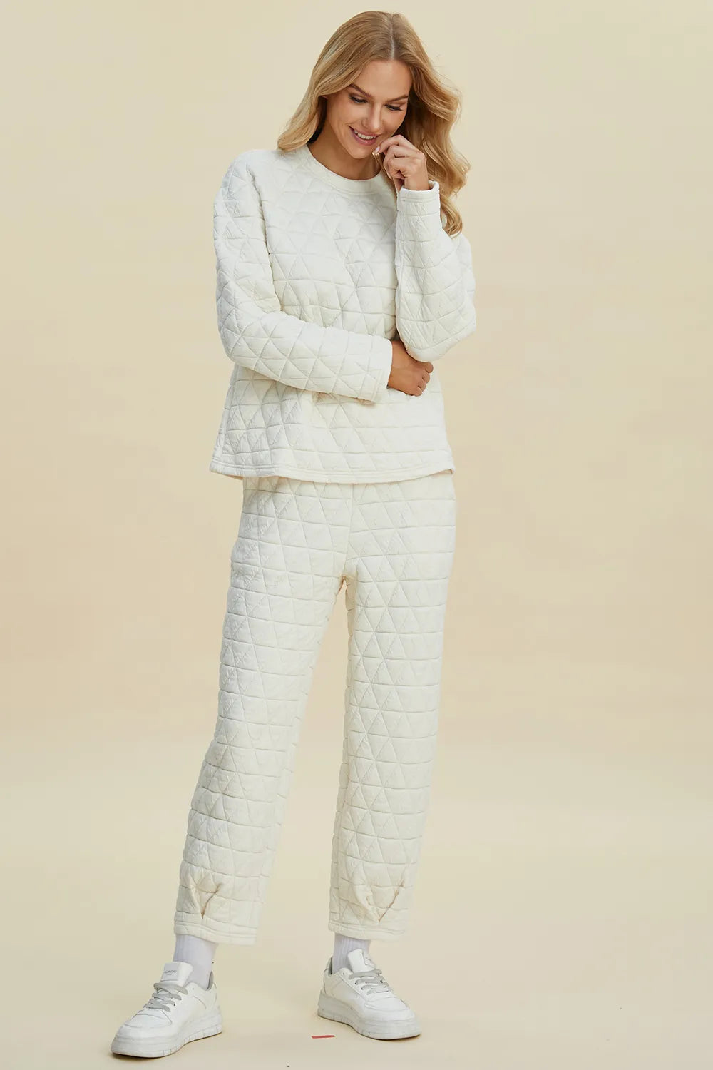 Beige Trendsi Double Take full-size textured round neck long sleeve top and matching pants set, casual and comfortable outfit.