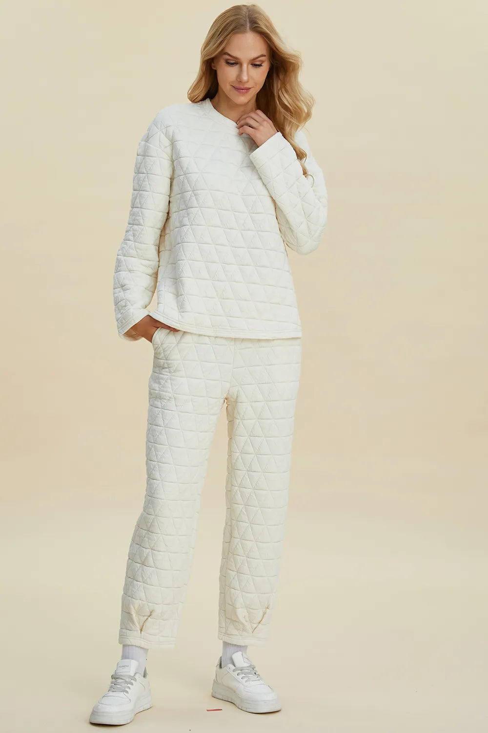 Beige Trendsi double take full size textured round neck long sleeve top with matching pants set, stylish and comfortable for everyday wear.