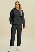 Beige Trendsi double take full size textured round neck long sleeve top and matching pants set, shown on a model.