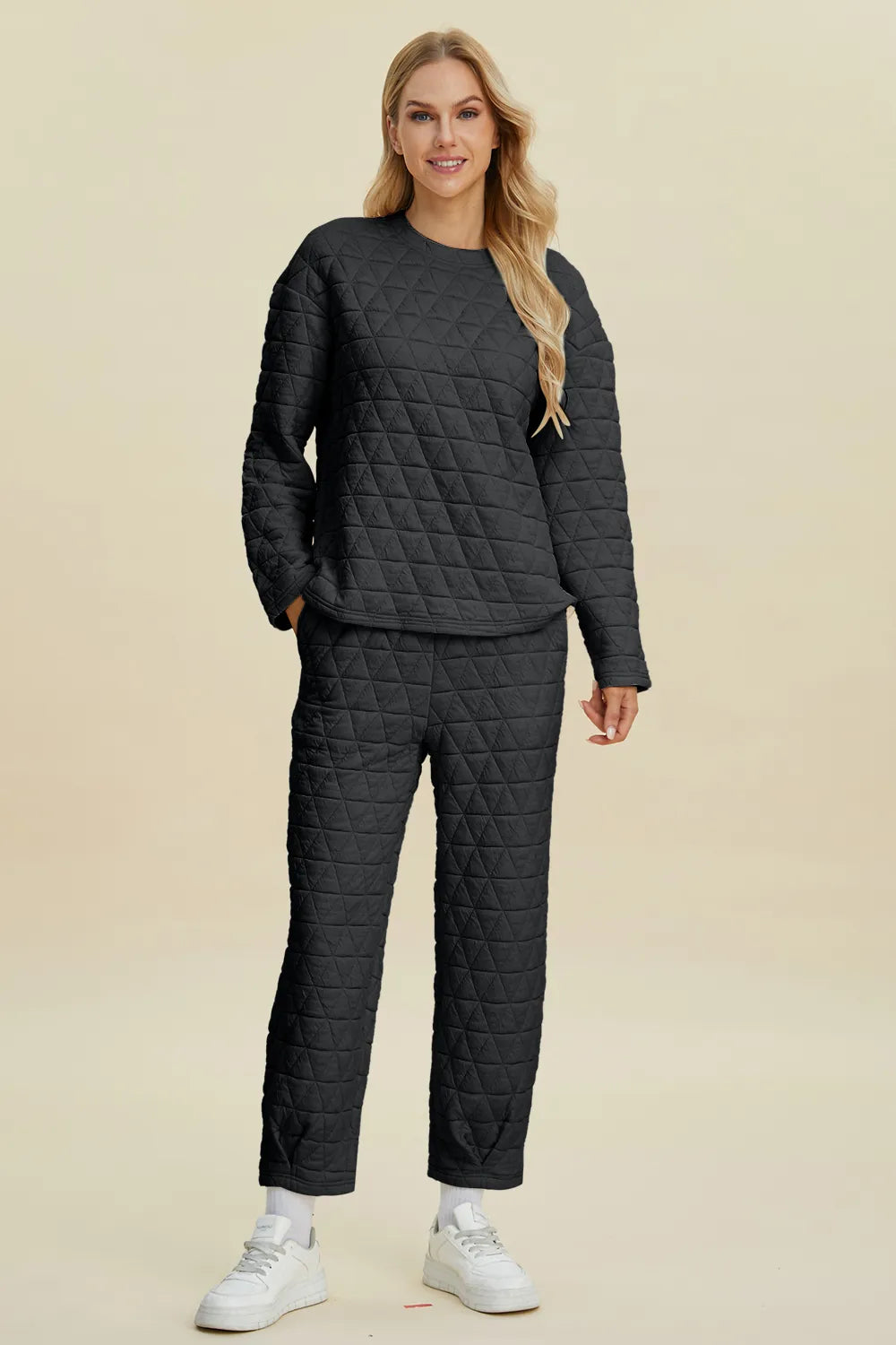 Beige Trendsi double take full size textured round neck long sleeve top and matching pants set, shown on a model.