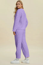 Beige textured pants from Trendsi's Double Take full size set featuring a matching round neck long sleeve top.